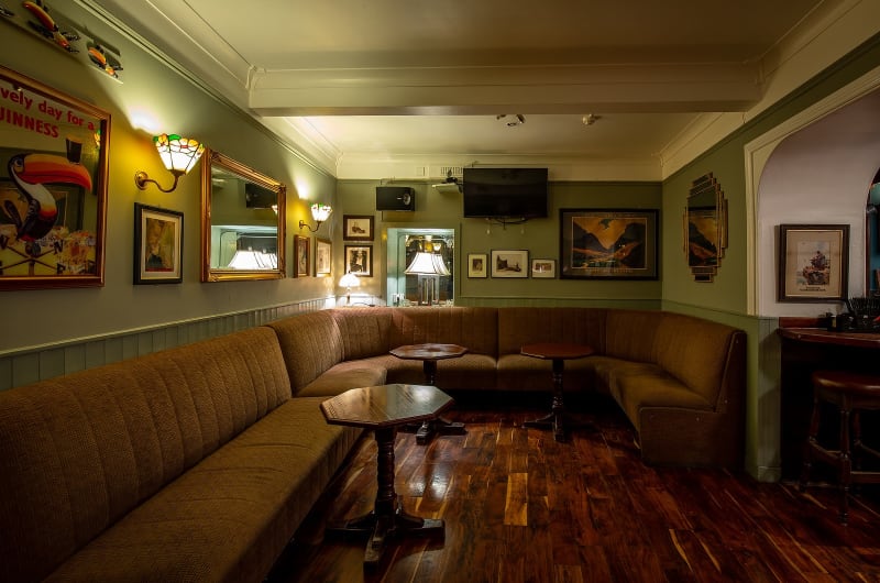 Traditional Pub Lounge With Corner Sofa And Tables