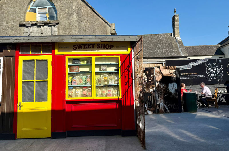 red and yellow painted sweet shop