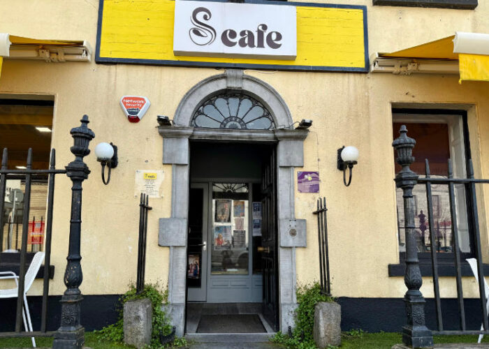 s cafe fence front door
