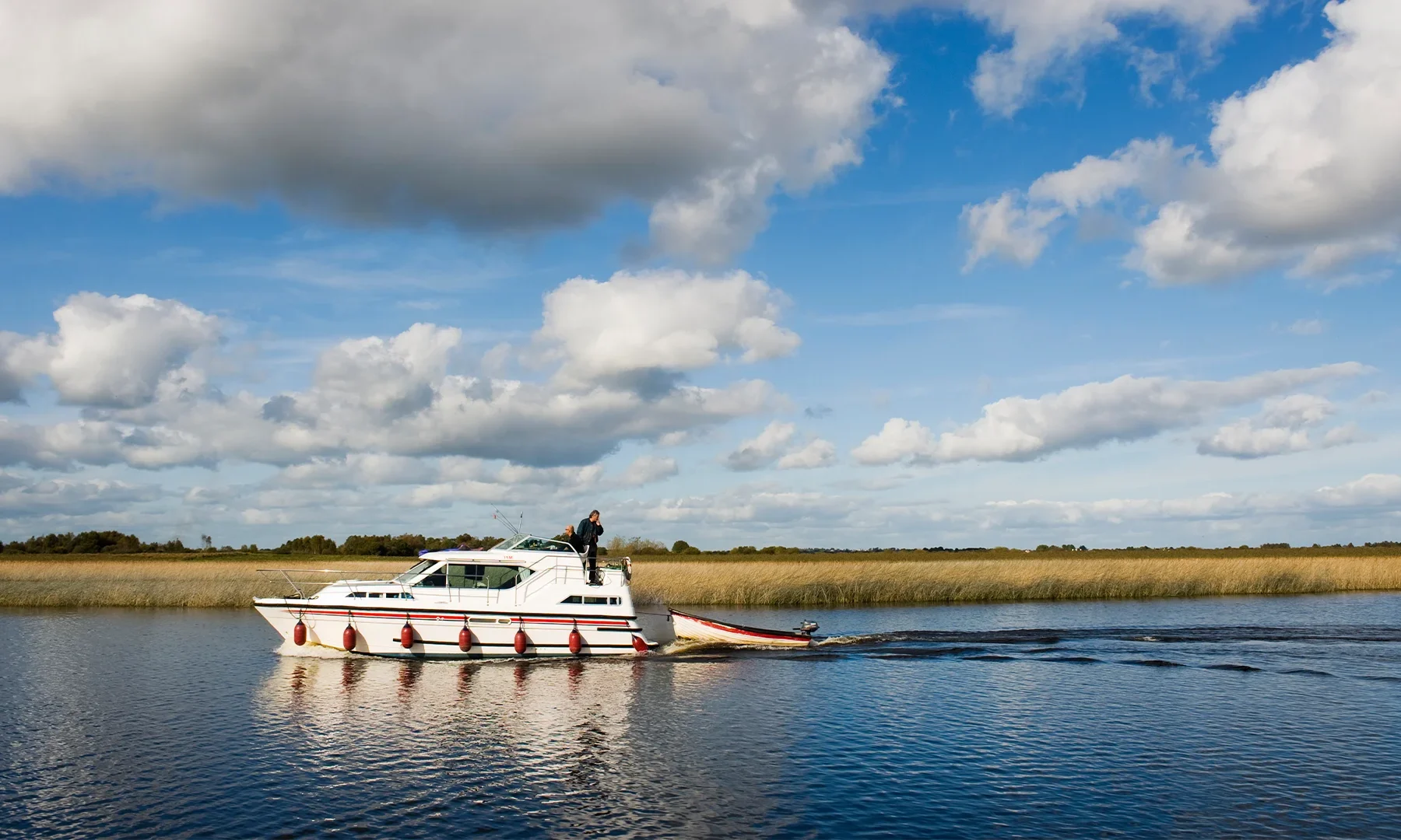 hero cruiser on river shannon blue sky clouds